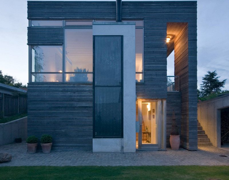 Mặt ngoài nhà thiết kế tối giản và ốp gỗ ngoại thất