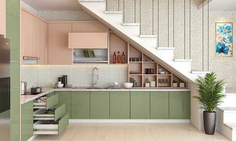 Bếp kết hợp với tủ được sắp xếp gọn gàng, màu xanh bơ làm điểm nhấn cho căn nhà